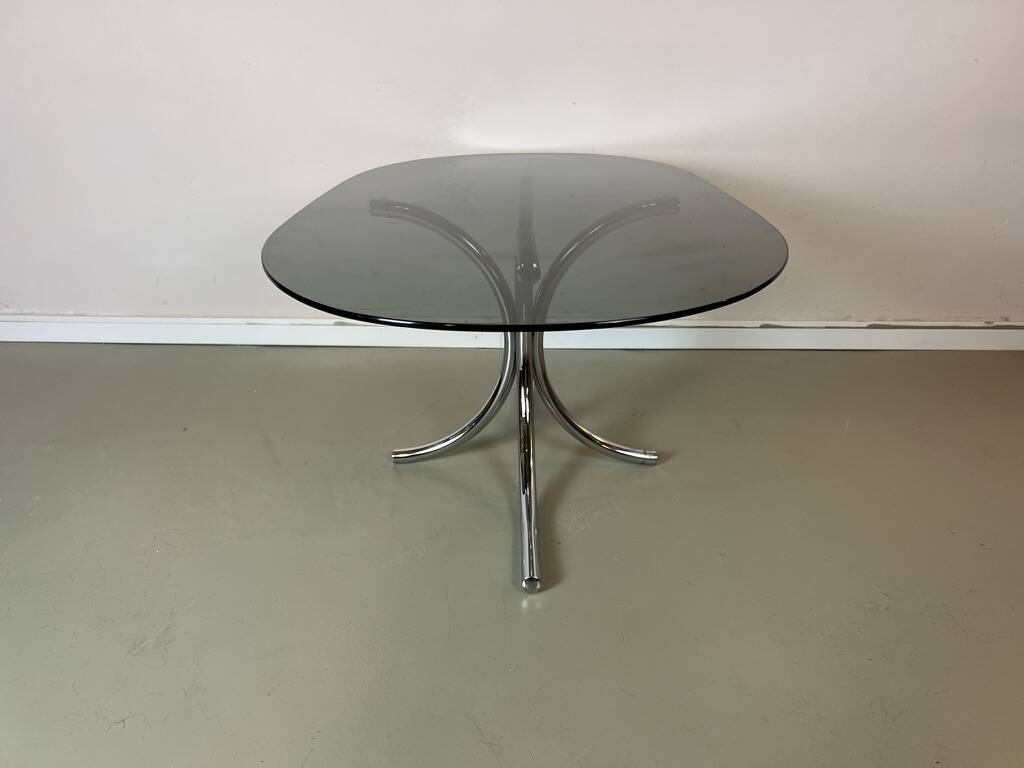 Vintage coffee table from the 70s in smoked glass and chrome, oval, Space Age style.