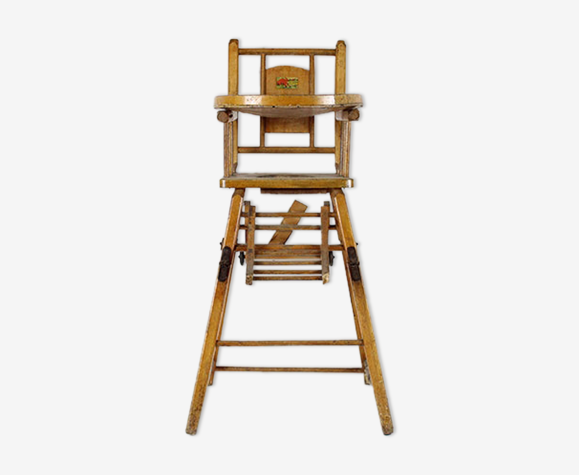 Chaise bébé en bois à roulettes