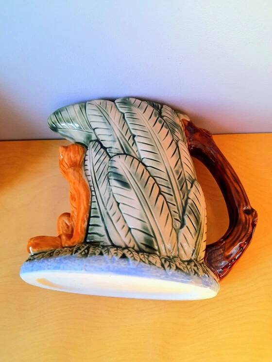 Zoomorphic pitcher in slipware, monkey.
