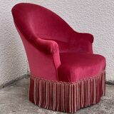 Old raspberry velvet toad armchair