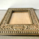Antique brass metal picture frame in baroque style