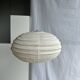 Average suspension in rattan and natural linen, Japanese-style, oval and flattened, H30 D4.