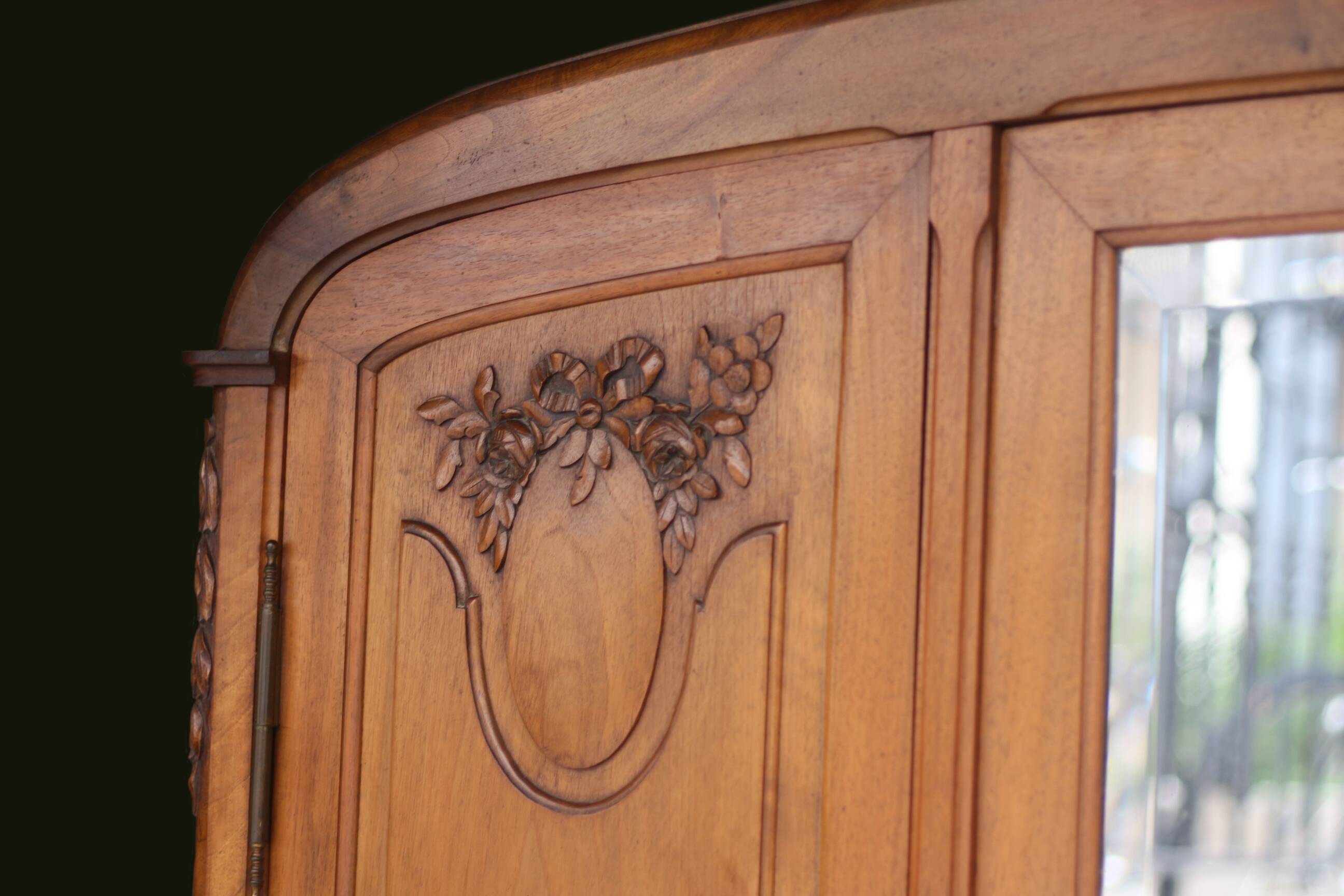 Majestic solid walnut wardrobe. Stamped work, late 19th century.