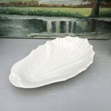 Scallop-shaped pocket emptier