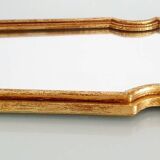 Miroir en bois doré à la feuille d'or