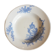 Assiette creuse en faïence à décor de fleurs