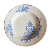 Assiette creuse en faïence à décor de fleurs