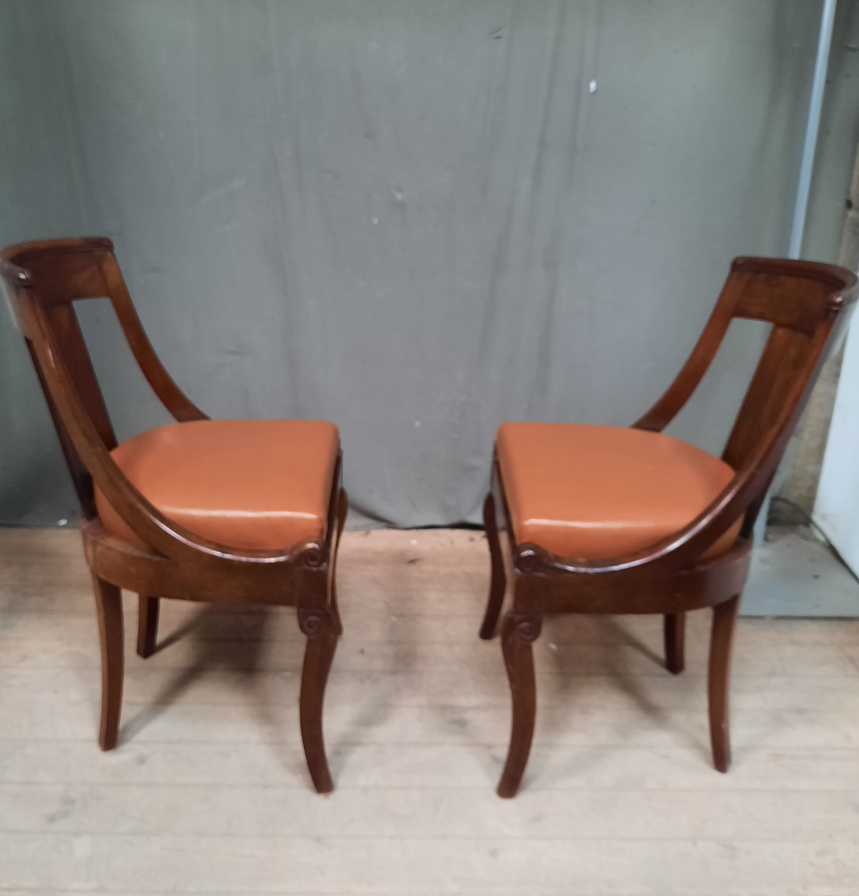 Pair of mahogany gondola chairs
