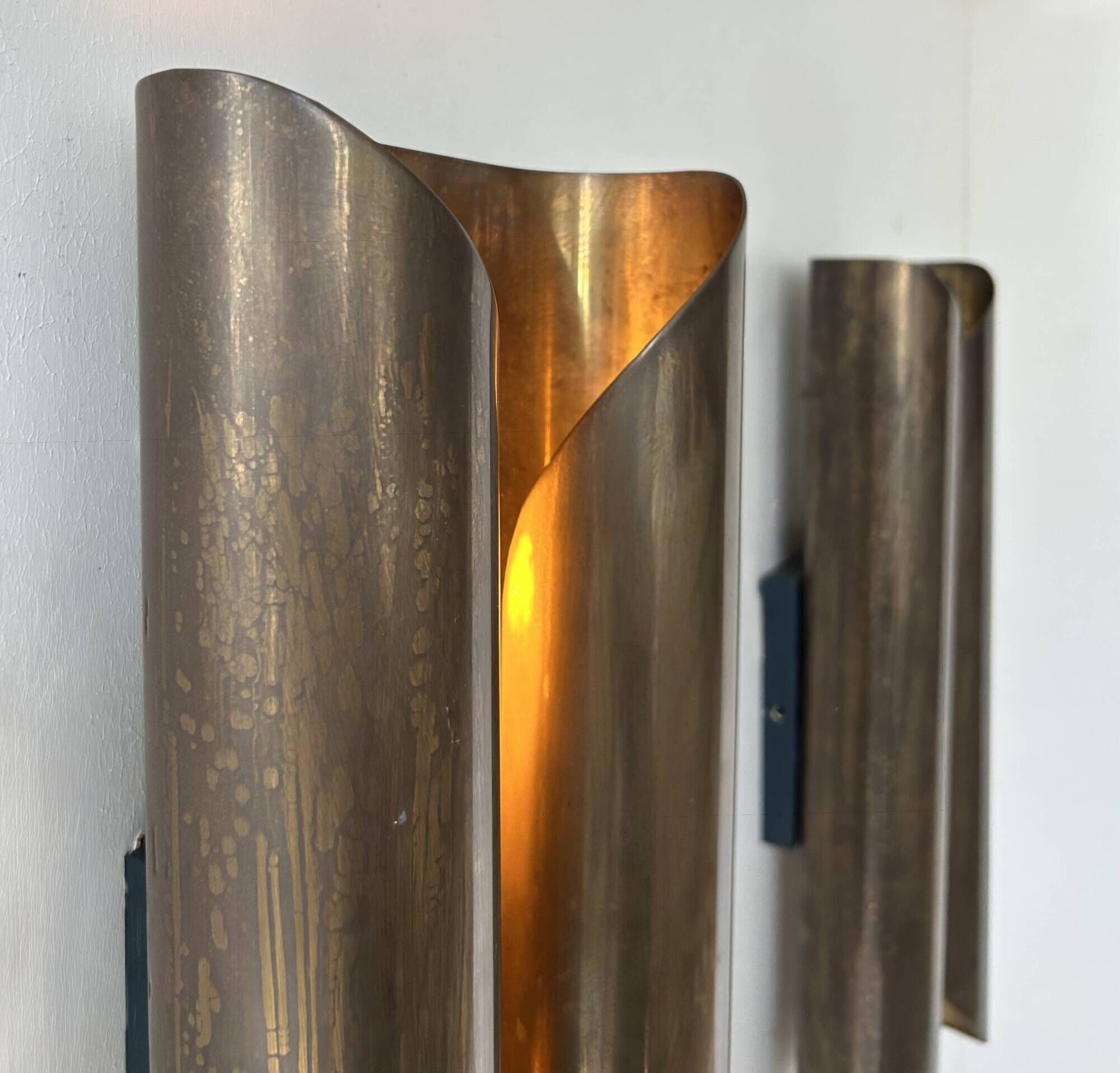 Pair of vintage wall lights in patinated brass, France 1970