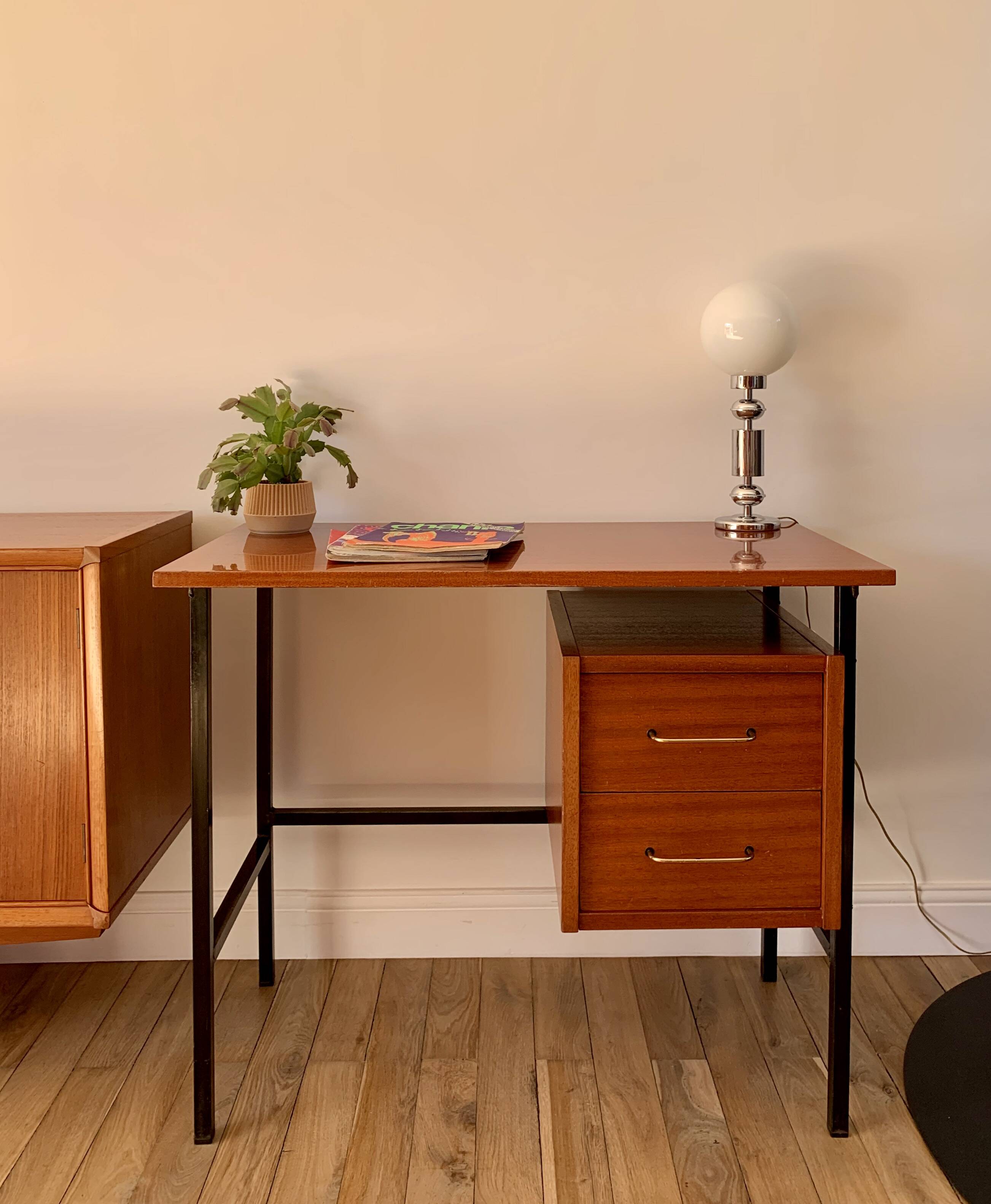 lacquered wood desk and black steel legs design from the 60s and 70s