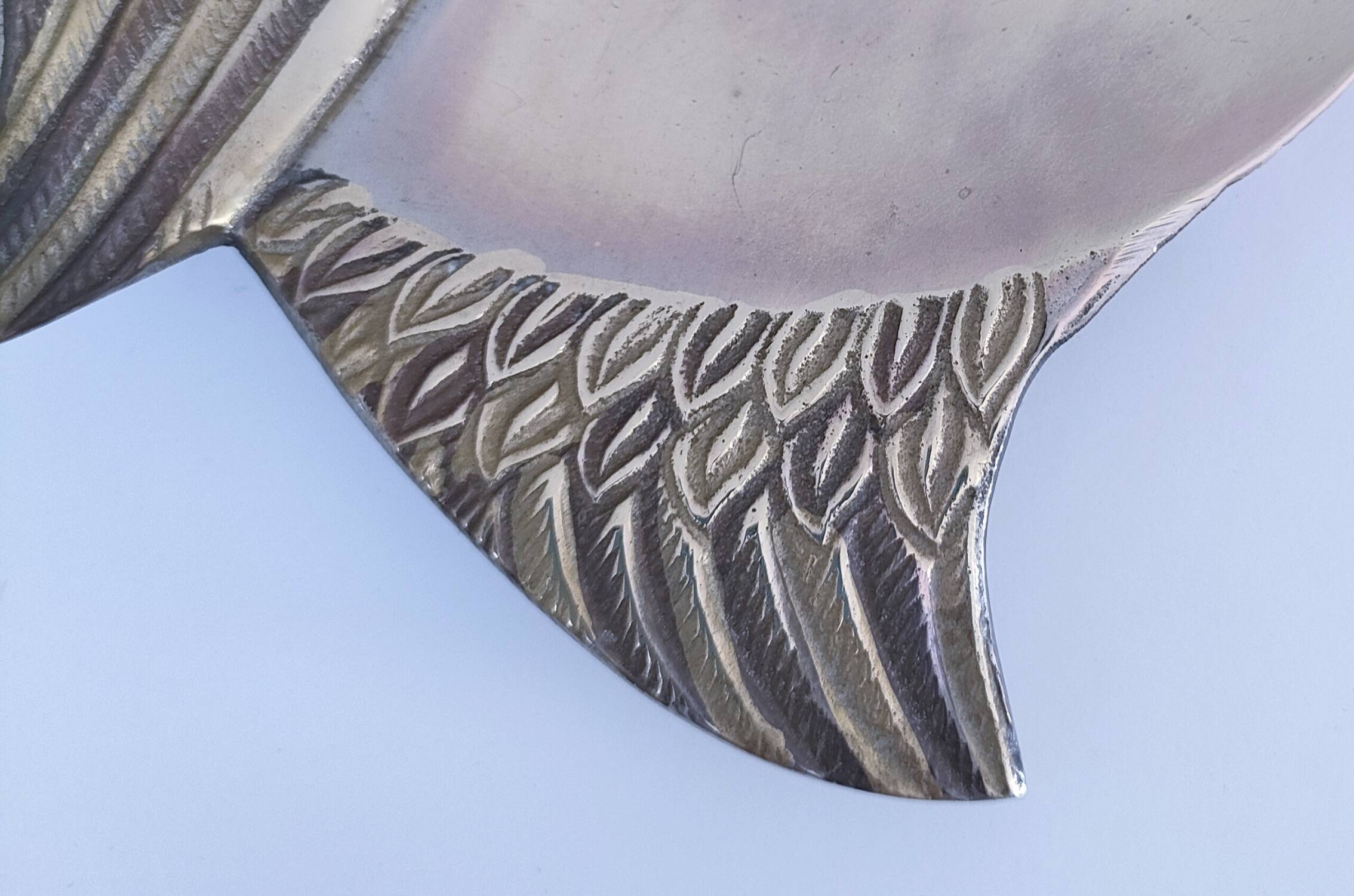 Empty pocket owl in gold and silver metal