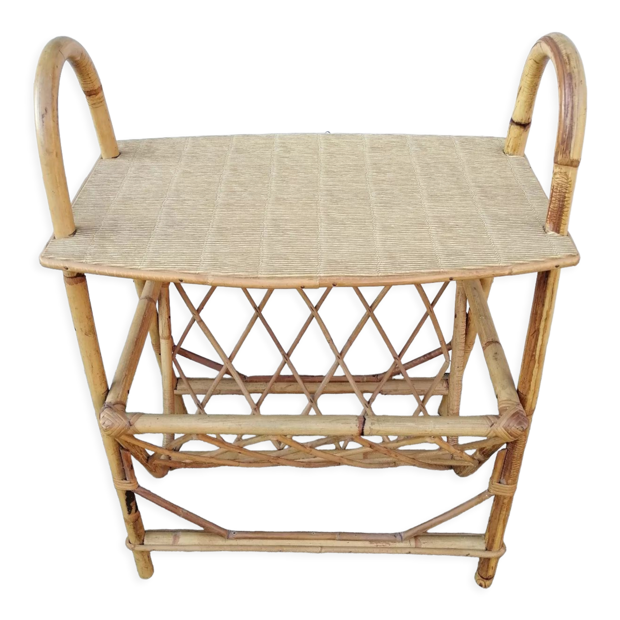 Rattan table at the end of the sofa