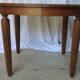 1930s oak dining table, slightly oval.
