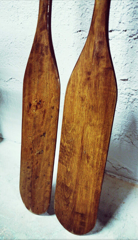 Pair of old wooden oars