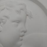 Portrait cast in low relief on plaster. SEDAP workshop.