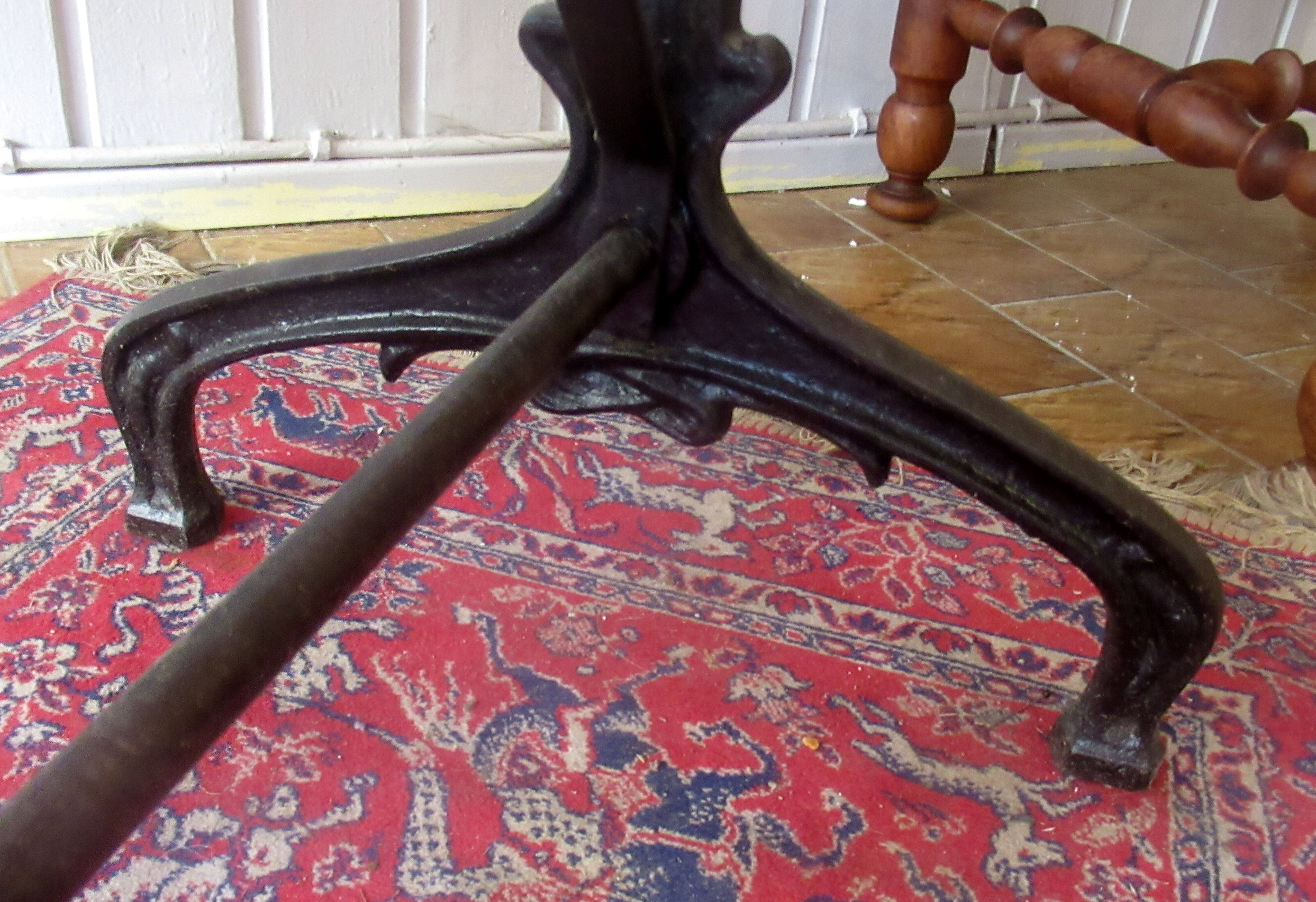 Bistro table, 1900, cast iron foot and marble top.