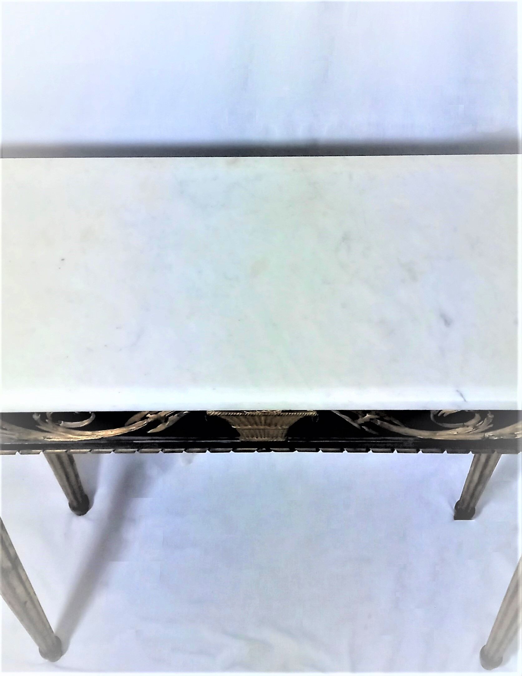 19th century Louis XVI style console table in black and gold with white marble shelf