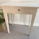 Old small table with a white patina / desk