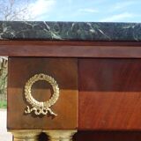 Flamed mahogany enfilade with sea green marble in Empire style.
