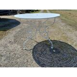 Wrought iron garden table, circa 1900