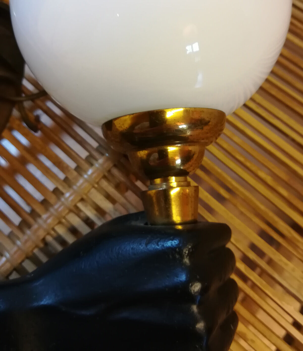 Pair of sconces in hands of Nubian by John Dévoluy