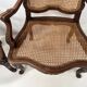 Paire de fauteuils de style Régence en bois naturel XIX siècle