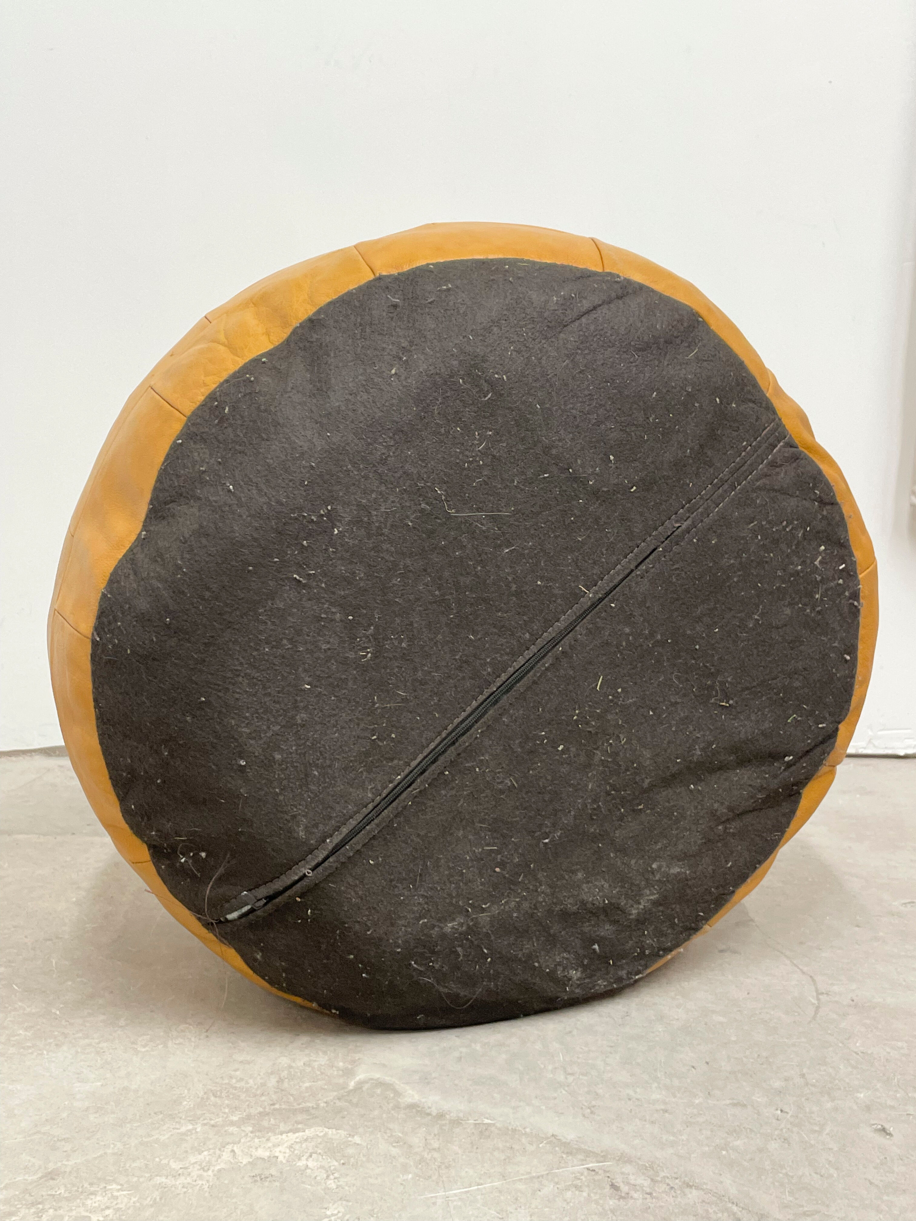 Ochre leather patchwork pouf