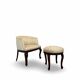 An antique Italian bar chair and a matching tufted vanity stool.