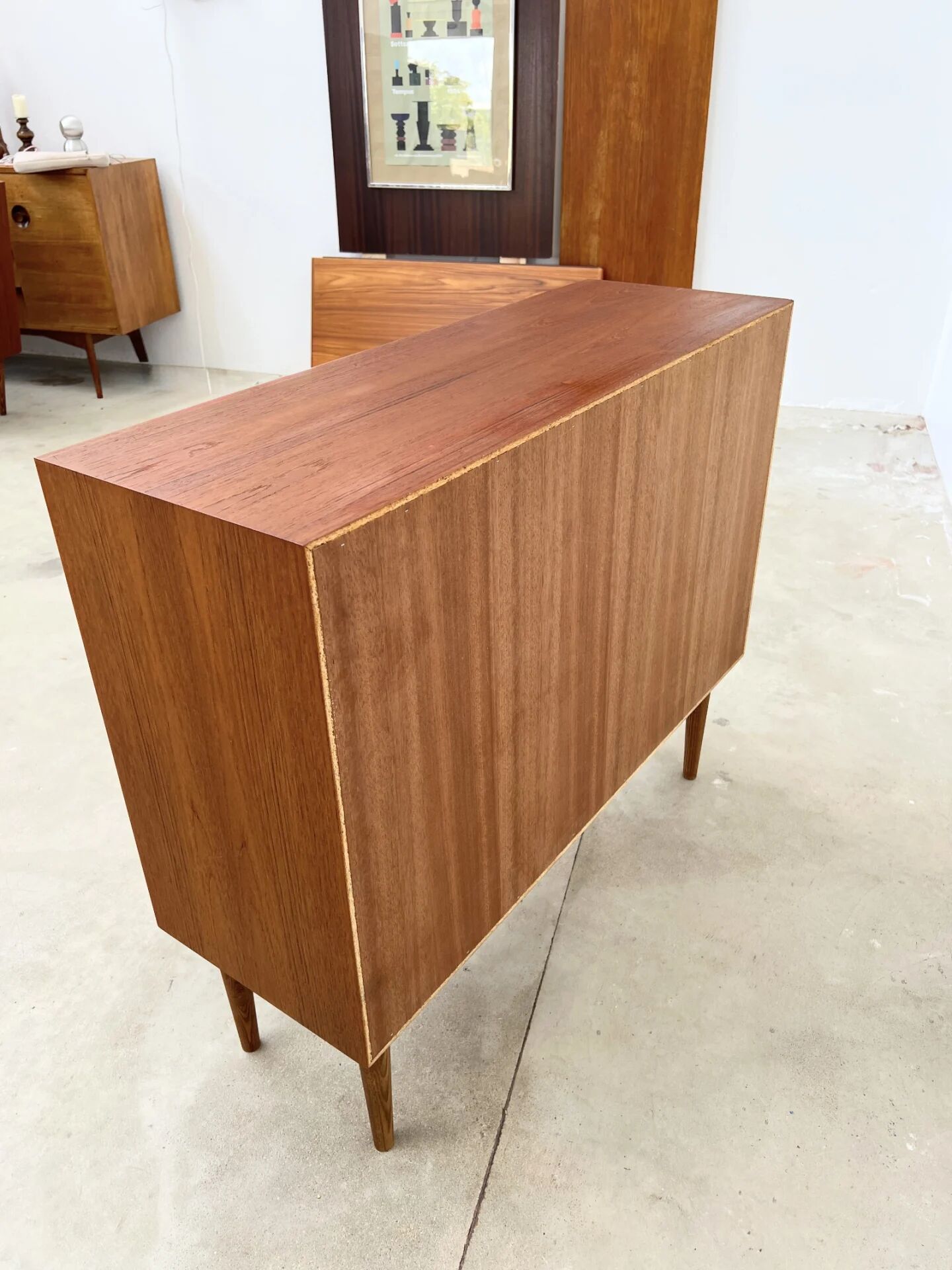 Small teak buffet with 2 doors, vintage Scandinavian style.