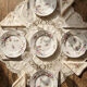 7 dessert plates Bernardaud Limoges porcelain with floral decoration from the 1920s to 1950s.