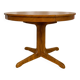 Round table with central base from the 1960s by Baumann.