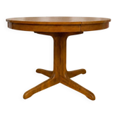 Round table with central base from the 1960s by Baumann.