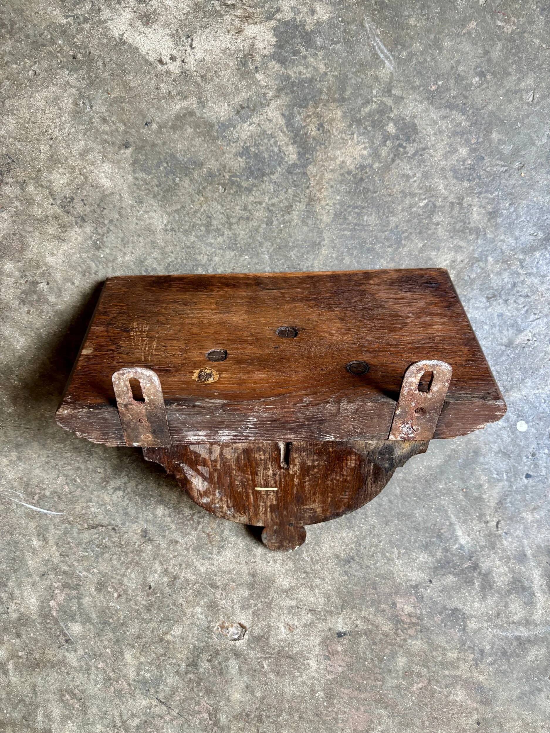 Dark wood wall shelf