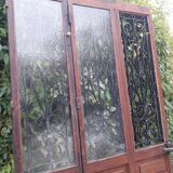 Porte d’entrée vitrée en chêne et grilles en fer, XIXème s.