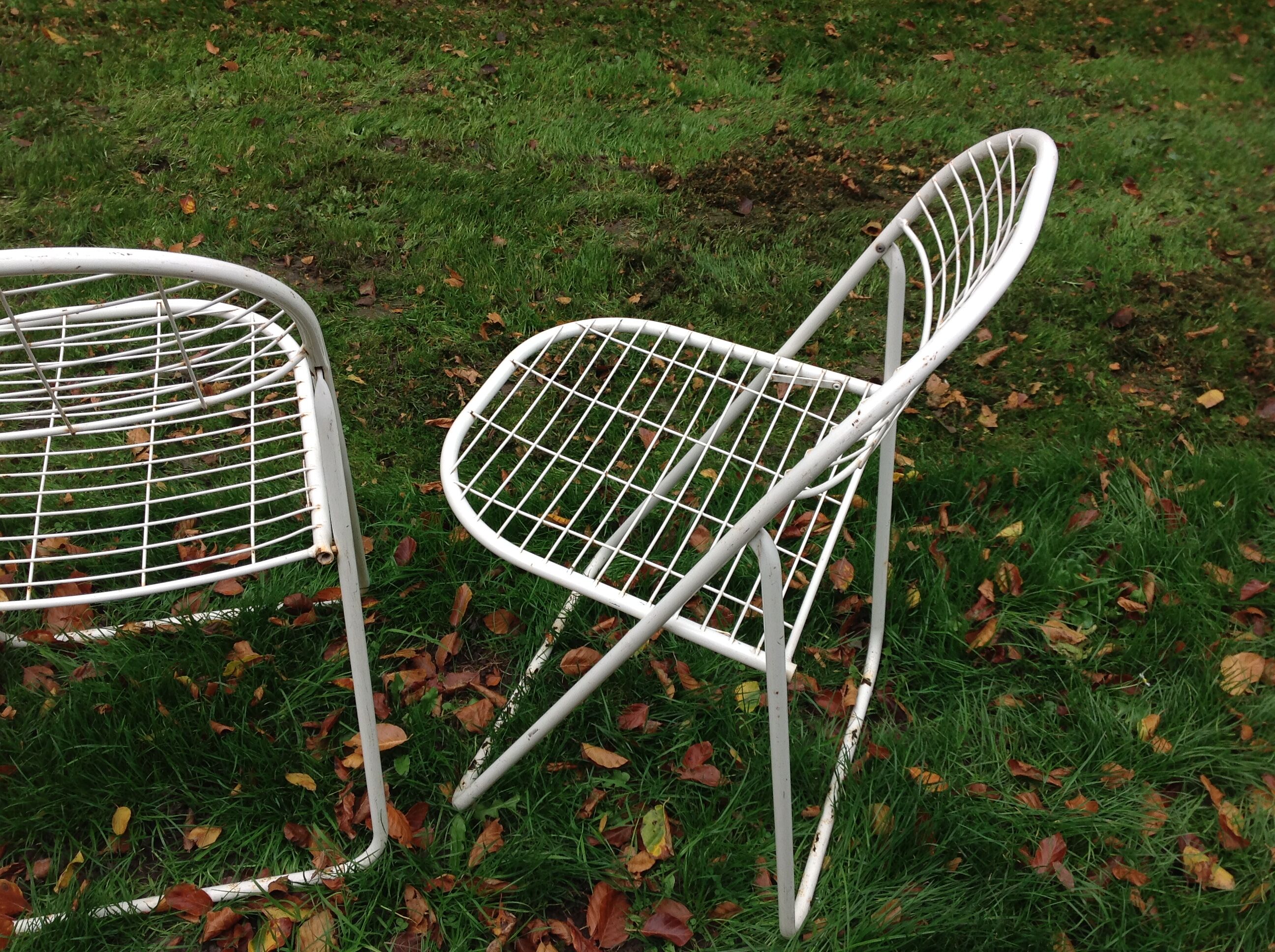 Trio of folding metal chairs