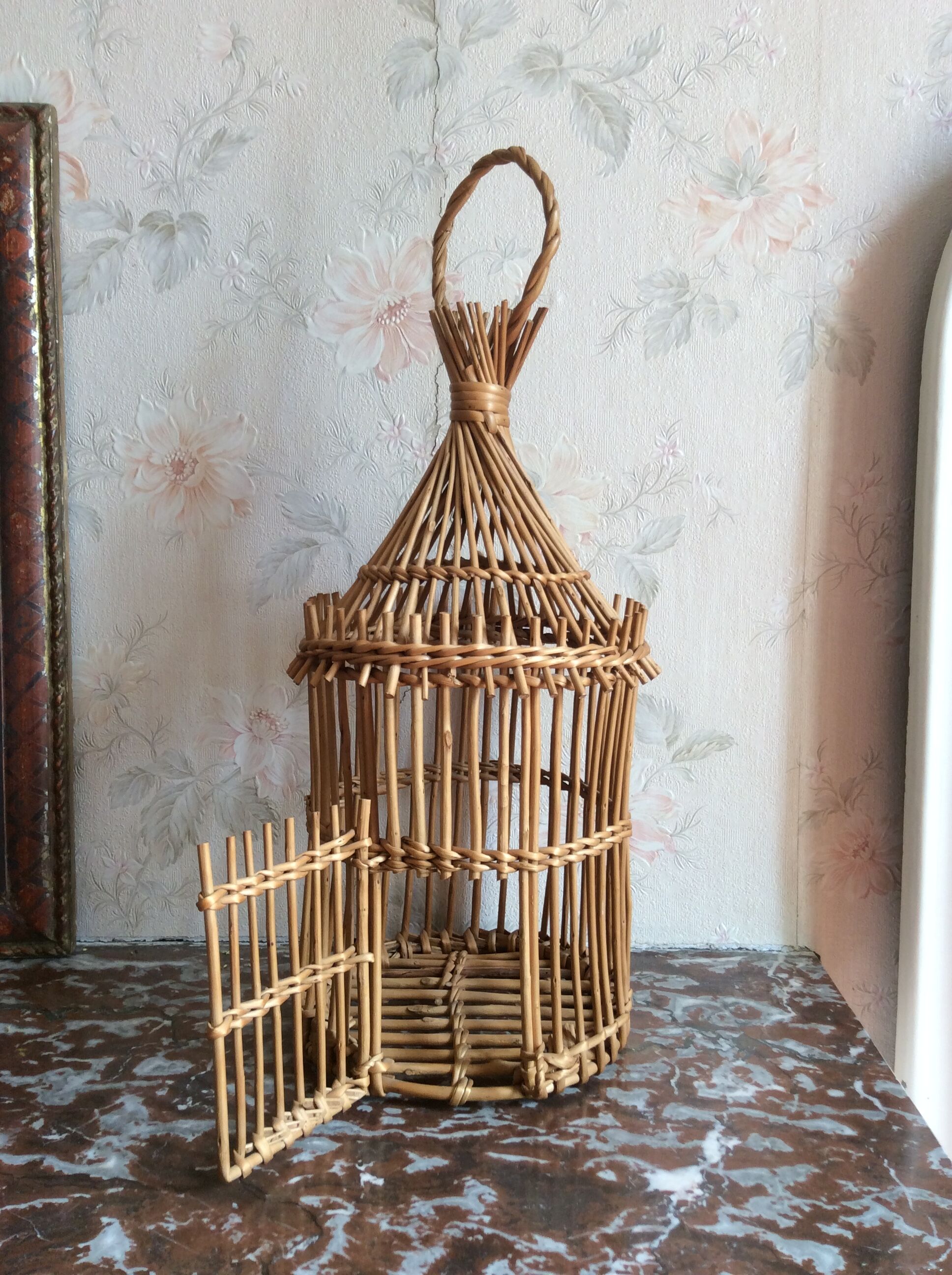 Vintage bird cage in rattan