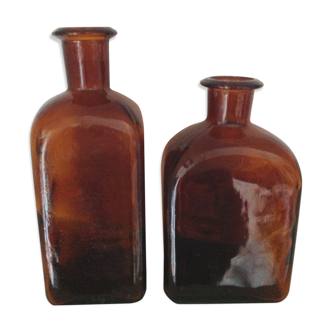 Duo of amber bottles