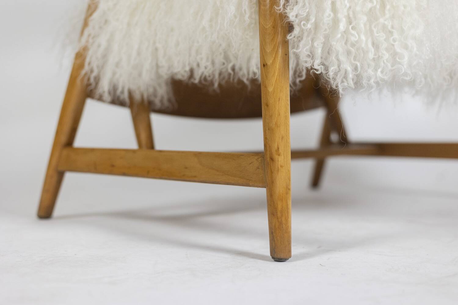 Pair of “lounge” armchairs in blond beech. 1950s