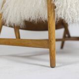 Pair of “lounge” armchairs in blond beech. 1950s