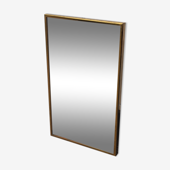 Mirror of the 70s in gilded metal, 60x35 cm
