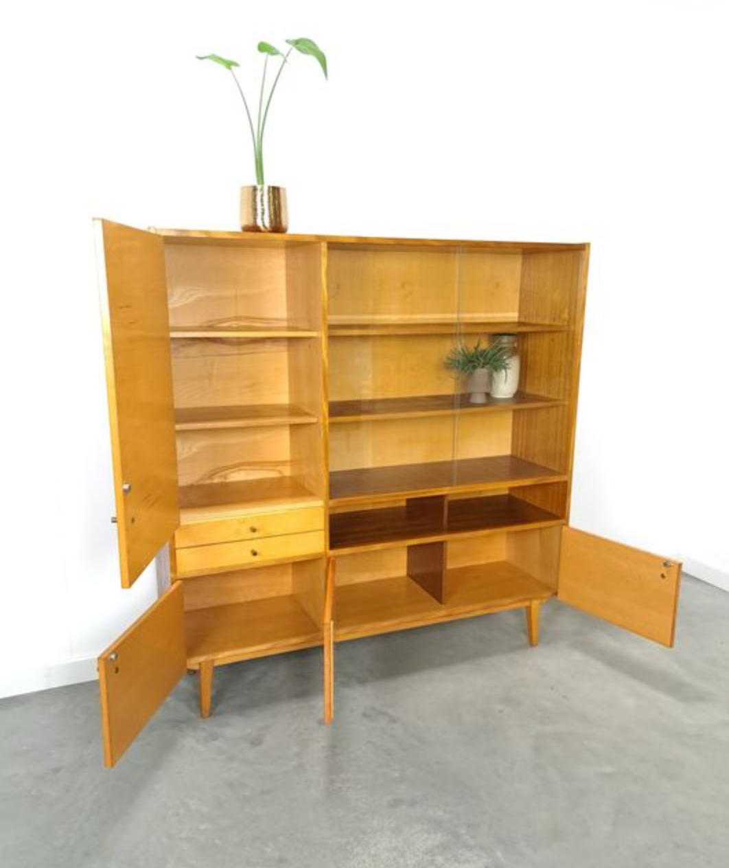 Vintage wooden sideboard with sliding glass doors and drawers