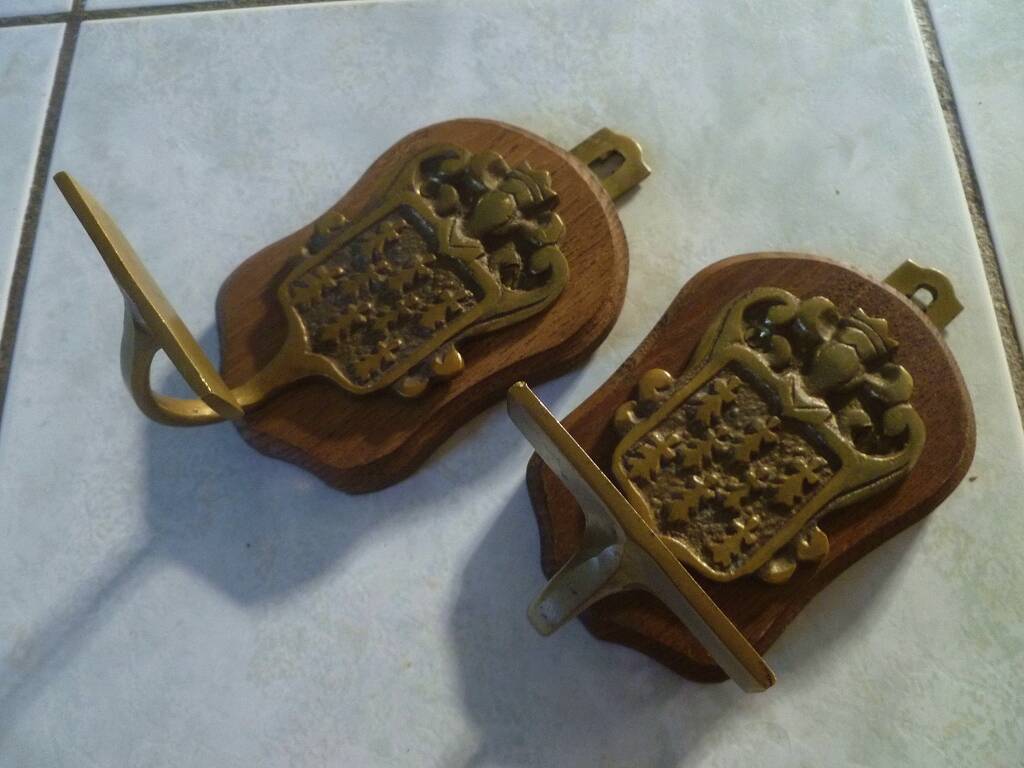 pair of vintage brass hooks