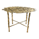 Carved brass coffee table with ginkgo decor