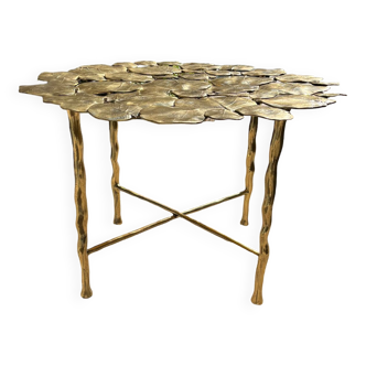 Carved brass coffee table with ginkgo decor