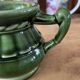Green ceramic milk jug
