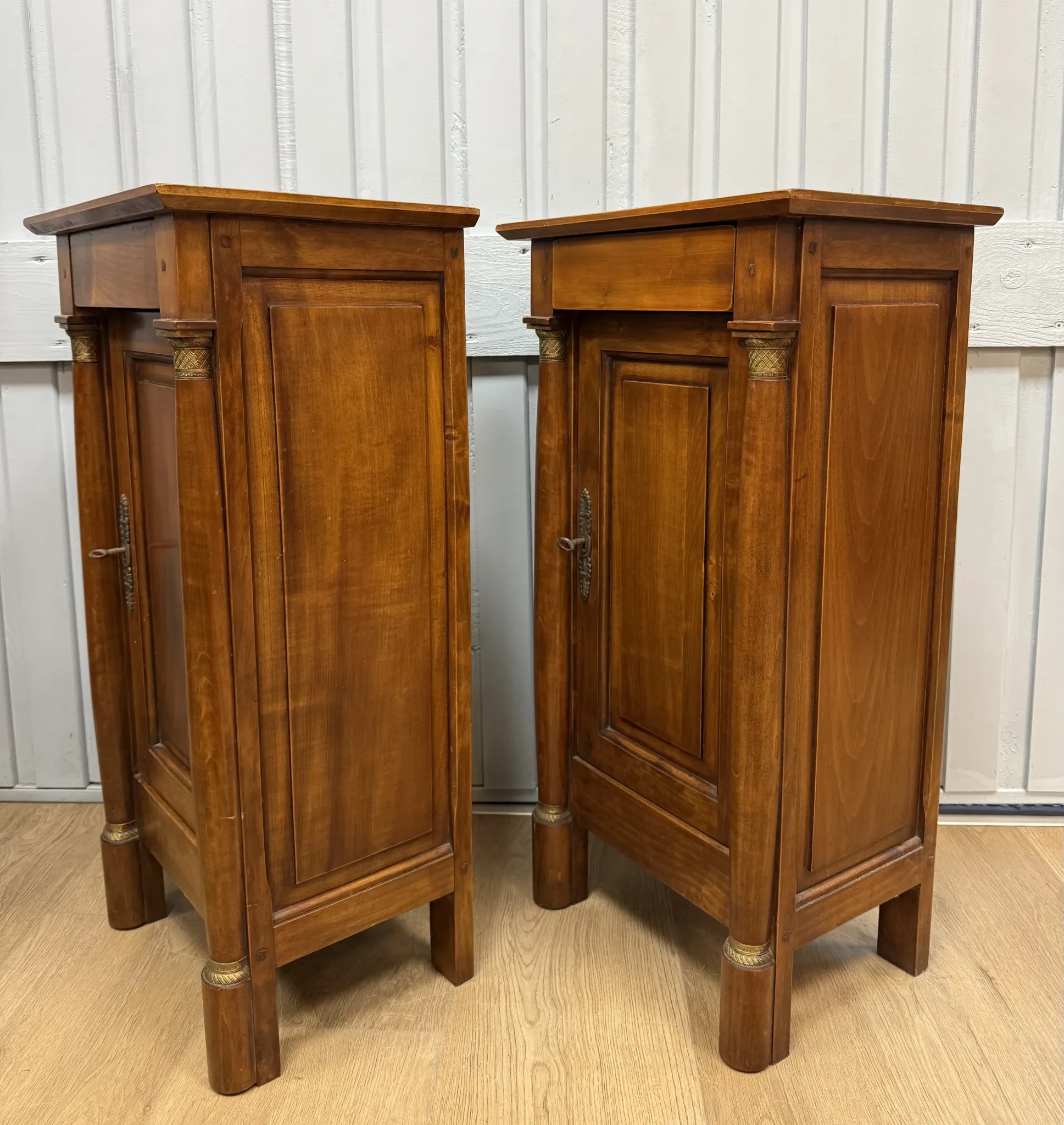 Pair of Empire style bedside tables