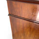 A pair of antique walnut bedside tables from the 1890s.