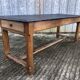 Antique oak farmhouse table with cat bar and 2 end drawers