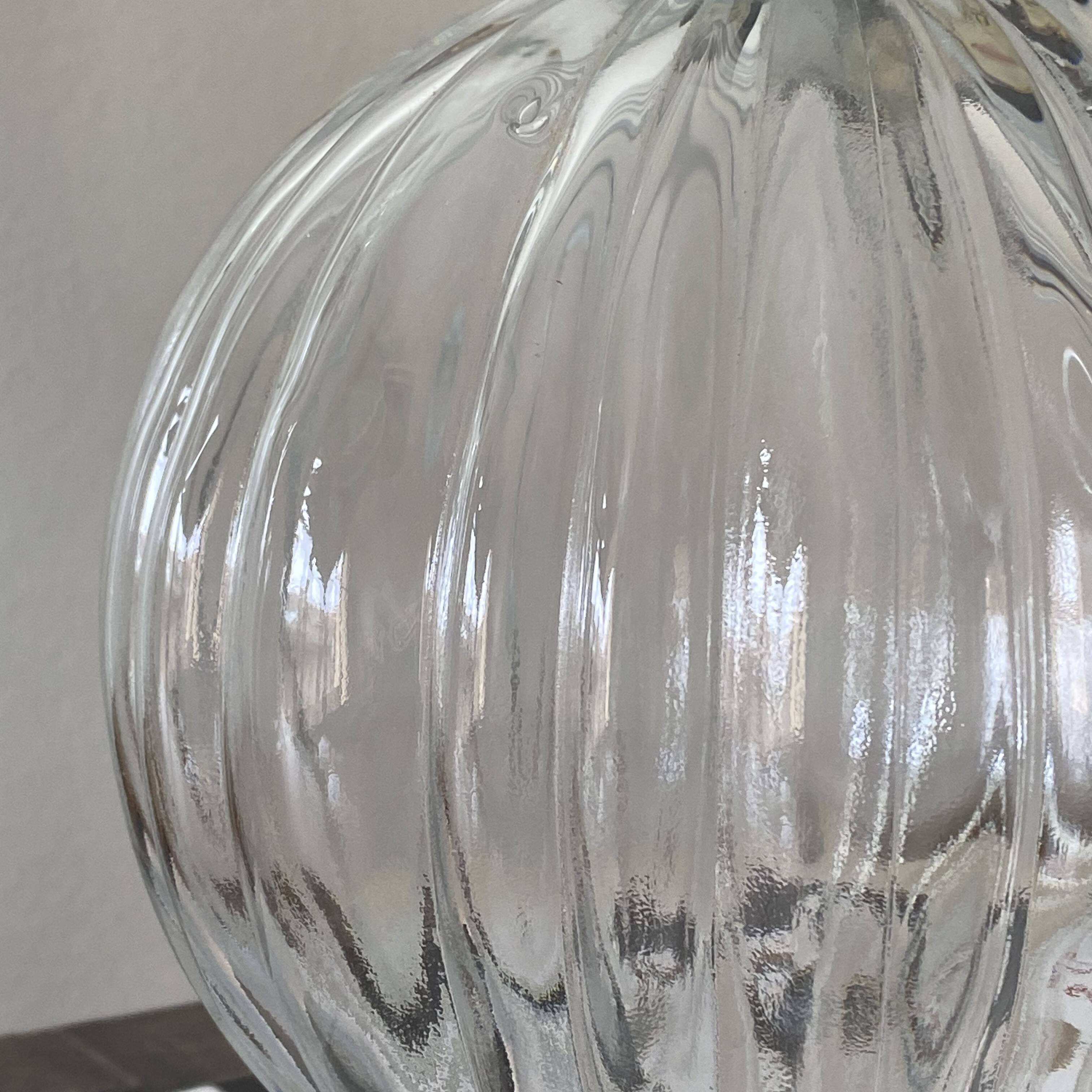 Old transparent glass globe for wall lamp chandelier.