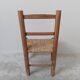 Vintage children's chair in wood and straw